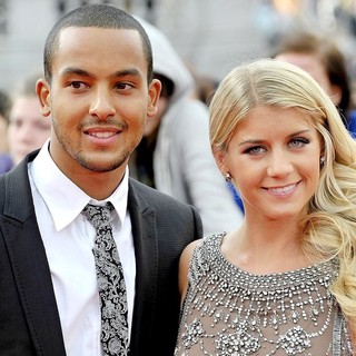 Theo Walcott, Melanie Slade in Harry Potter and the Deathly Hallows Part II World Film Premiere - Arrivals