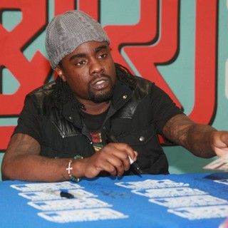 Wale in Wale Signs Copies of His Album Ambition