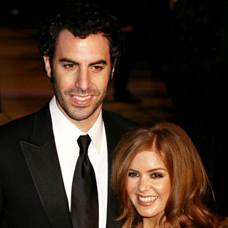 Sacha Baron Cohen, Isla Fisher in Vanity Fair Oscar Party