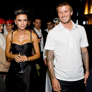 Victoria Adams, David Beckham in The AC Milan Team Attend A Dinner