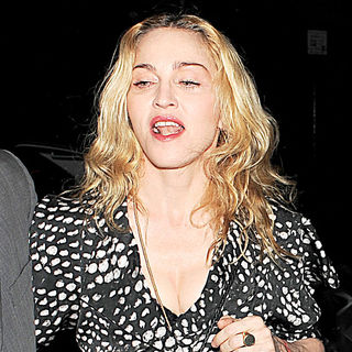 Madonna in Madonna is all smiles as she arrives at Cecconi's restaurant in Mayfair with her bodyguard
