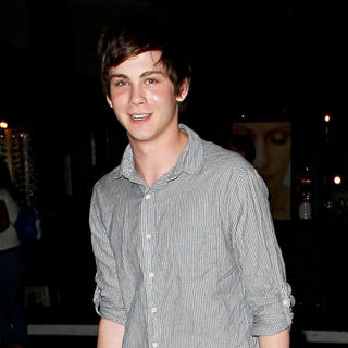 Logan Lerman goes to a movie theatre with a friend