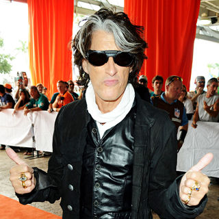 Joe Perry in Joe Perry arrives at the Orange Carpet before Miami Dolphins vs New England Patriots football game