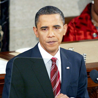 Barack Obama in President Barack Obama speaking at his first State of the Union address