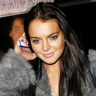 Lindsay Lohan leaving Madeo restaurant in West Hollywood