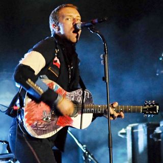 Chris Martin in Coldplay performing live at the Stadium of the Morumbi