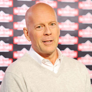 Bruce Willis in Bruce Willis Prepares A Cocktail During A Press Conference to Promote Sobieski Vodka