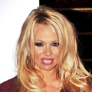 Pamela Anderson in A Press Conference and Photocall to Officially Announce Role as The Genie in Production of "Aladdin"
