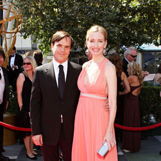 Marcelo Zarvos, Janel Moloney in 2010 Creative Arts Emmy Awards - Arrivals