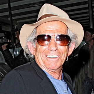 Keith Richards in Keith Richards Leaves C London Restaurant Wearing a Fedora Hats and Sunglasses