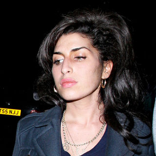 Amy Winehouse in Amy Winehouse Leaving A Secret Charity Gig Called 'Apocalypstick'