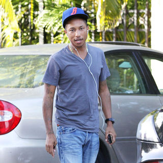 Pharrell Williams in Pharrell Williams Visits The Art Basel Festival