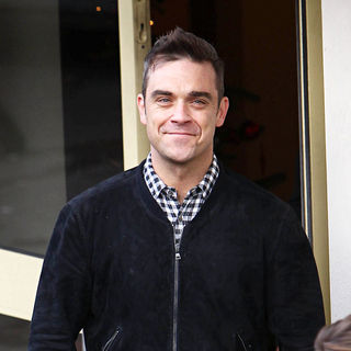Robbie Williams in Robbie Williams Arrives at 'The X Factor' Studios Ahead of This Weekend's Live Final Shows