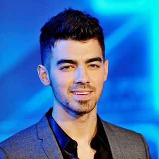 Joe Jonas, Jonas Brothers in Los Angeles Premiere of "Tron Legacy"