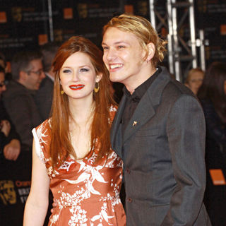 Bonnie Wright, Jamie Campbell Bower in 2011 Orange British Academy Film Awards (BAFTAs) - Arrivals
