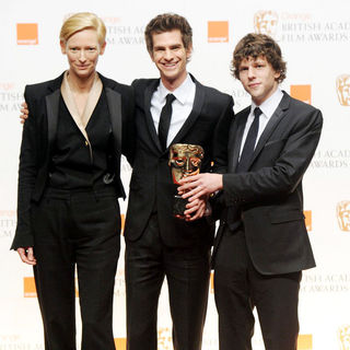 Tilda Swinton, Andrew Garfield, Jesse Eisenberg in 2011 Orange British Academy Film Awards (BAFTAs) - Press Room