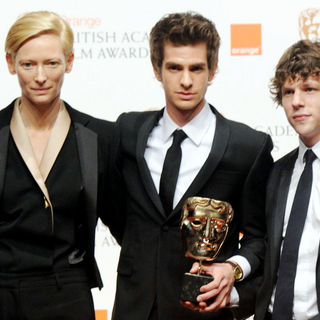 Tilda Swinton, Andrew Garfield, Jesse Eisenberg in 2011 Orange British Academy Film Awards (BAFTAs) - Press Room