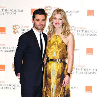 Dominic Cooper, Rosamund Pike in 2011 Orange British Academy Film Awards (BAFTAs) - Press Room