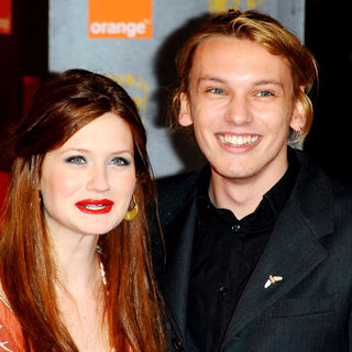 Bonnie Wright, Jamie Campbell Bower in 2011 Orange British Academy Film Awards (BAFTAs) - Arrivals