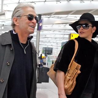 Michael Douglas, Catherine Zeta-Jones in Michael Douglas and Catherine Zeta-Jones Arriving at Heathrow Airport