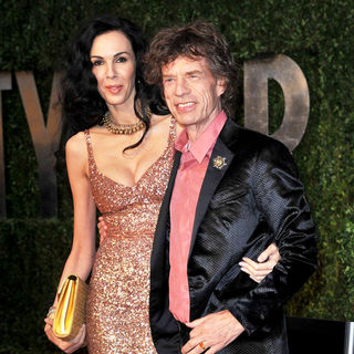 L'Wren Scott, Mick Jagger in 2011 Vanity Fair Oscar Party - Arrivals