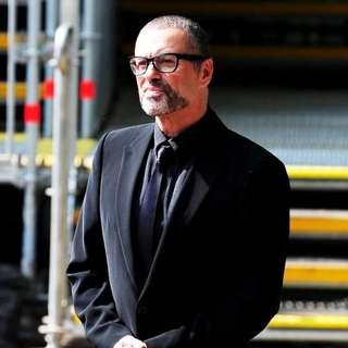 George Michael in Celebrities Seen Filming During Preparations for The Royal Wedding