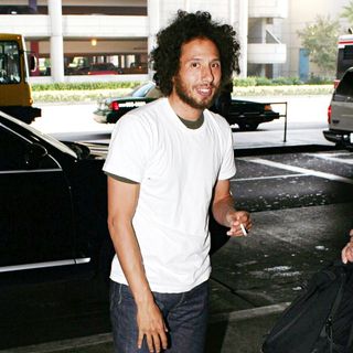 Zack de la Rocha of Rage Against the Machine enjoys a cigarette as he arrives at LAX Airport - wenn5182927