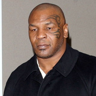Mike Tyson in Mike Tyson arriving at Salt Lake City airport for the 2009 Sundance Film Festival, Day 2