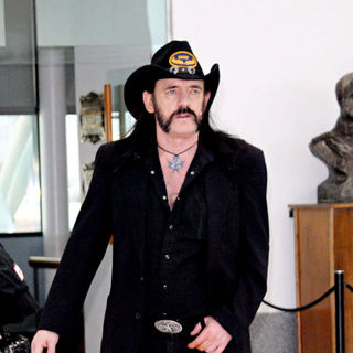 Lemmy, Motorhead in Lemmy of Motorhead arrives at he airport to check in his luggage, before boarding a flight to Brazil