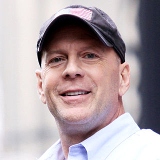 Bruce Willis watches Paul McCartney performing live on the marquee of the Ed Sullivan Theater - wenn5324233