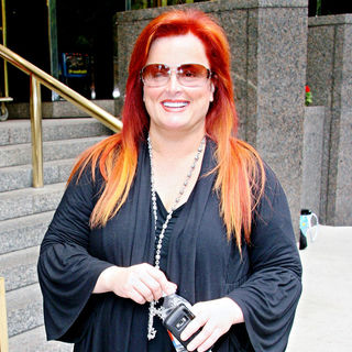 Wynonna Judd in Wynonna Judd Leaving Her Hotel Wearing A Large Cross Pendant