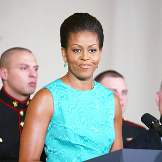 Michelle Obama in Michelle Obama thanks the volunteers who helped put up the White House Christmas decorations