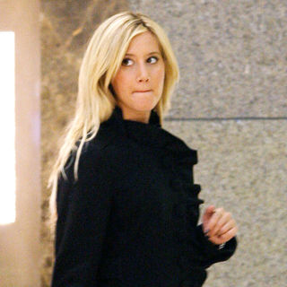 Ashley Tisdale carrying a Louis Vuitton shopping bag while out shopping with her mother - wenn5404980