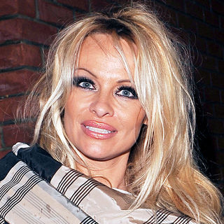Pamela Anderson in Pamela Anderson departs the New Wimbledon Theatre after appearing in 'Aladdin'
