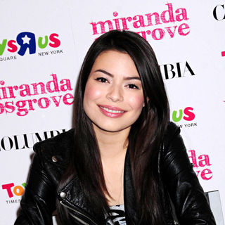 Miranda Cosgrove in Miranda Cosgrove signs copies of her new album 'Sparks Fly'