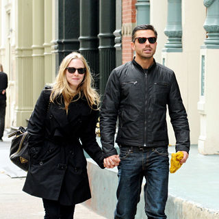 Amanda Seyfried, Dominic Cooper in Amanda Seyfried and Dominic Cooper hold hands as they stroll through Soho