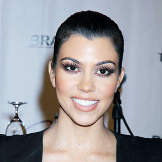 Kourtney Kardashian in A Press Conference Announcing The 'Kardashian Khaos' Store Opening - wenn5506782