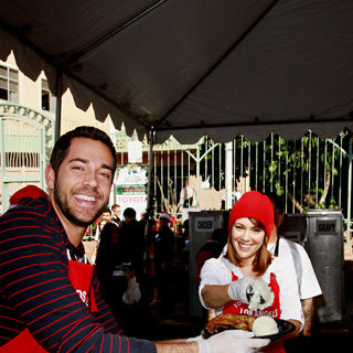 Zachary Levi, Alyssa Milano in Celebrities Volunteer on Christmas Eve to Serve The Homeless