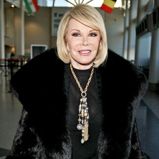 Joan Rivers in Joan Rivers Arriving at LAX Airport with Her Daughter to Catch A Flight