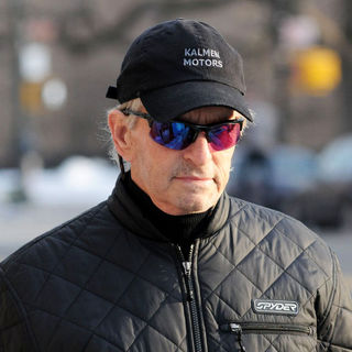 Michael Douglas in Michael Douglas Arrives Home with A Newspaper After Walking His Daughter to School