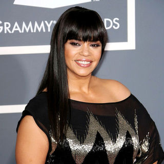 Faith Evans in The 53rd Annual GRAMMY Awards - Red Carpet Arrivals