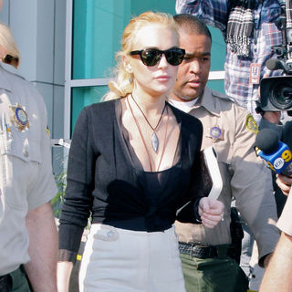 Lindsay Lohan in Lindsay Lohan Departs The Los Angeles County Superior Court Airport Courthouse