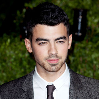 Joe Jonas, Jonas Brothers in 2011 Vanity Fair Oscar Party - Arrivals