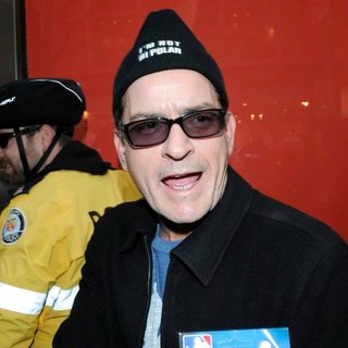 Charlie Sheen in Charlie Sheen Accepts A Package of Wristbrands from His Supporters