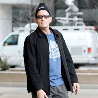 Charlie Sheen in Charlie Sheen Departs His Hotel and Proceeds to Walk to Massey Hall