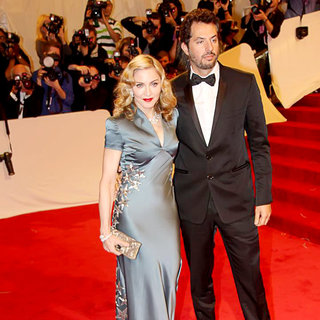 Madonna, Guy Oseary in Alexander McQueen: Savage Beauty Costume Institute Gala