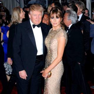 Donald Trump, Melania Trump in Alexander McQueen: Savage Beauty Costume Institute Gala