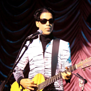 Prince in Prince Performing on Stage Before Accepting A Lifetime Achievement Award