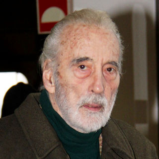 Christopher Lee in Christopher Lee Walking with A Cane as He Is Checking In at Tegel Airport