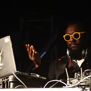 will.i.am in will.i.am Serving as DJ During A Set at The EF Summeranza Student Exchange Event
